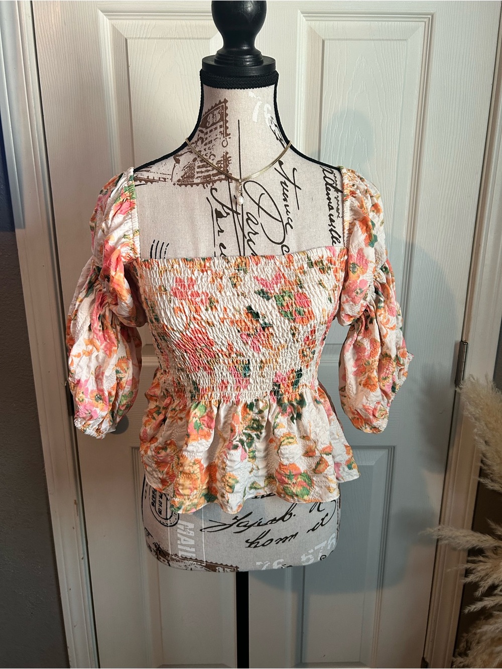 Floral Smocked Peplum Top
